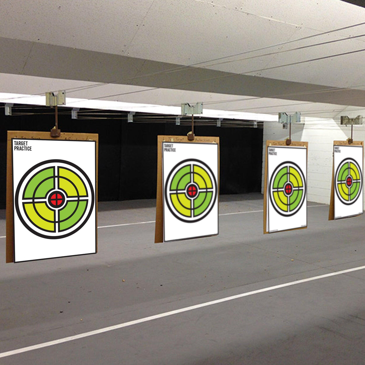 Large circle paper shooting targets hanging for practice, ideal for gun, rifle, pistol, and airsoft training.