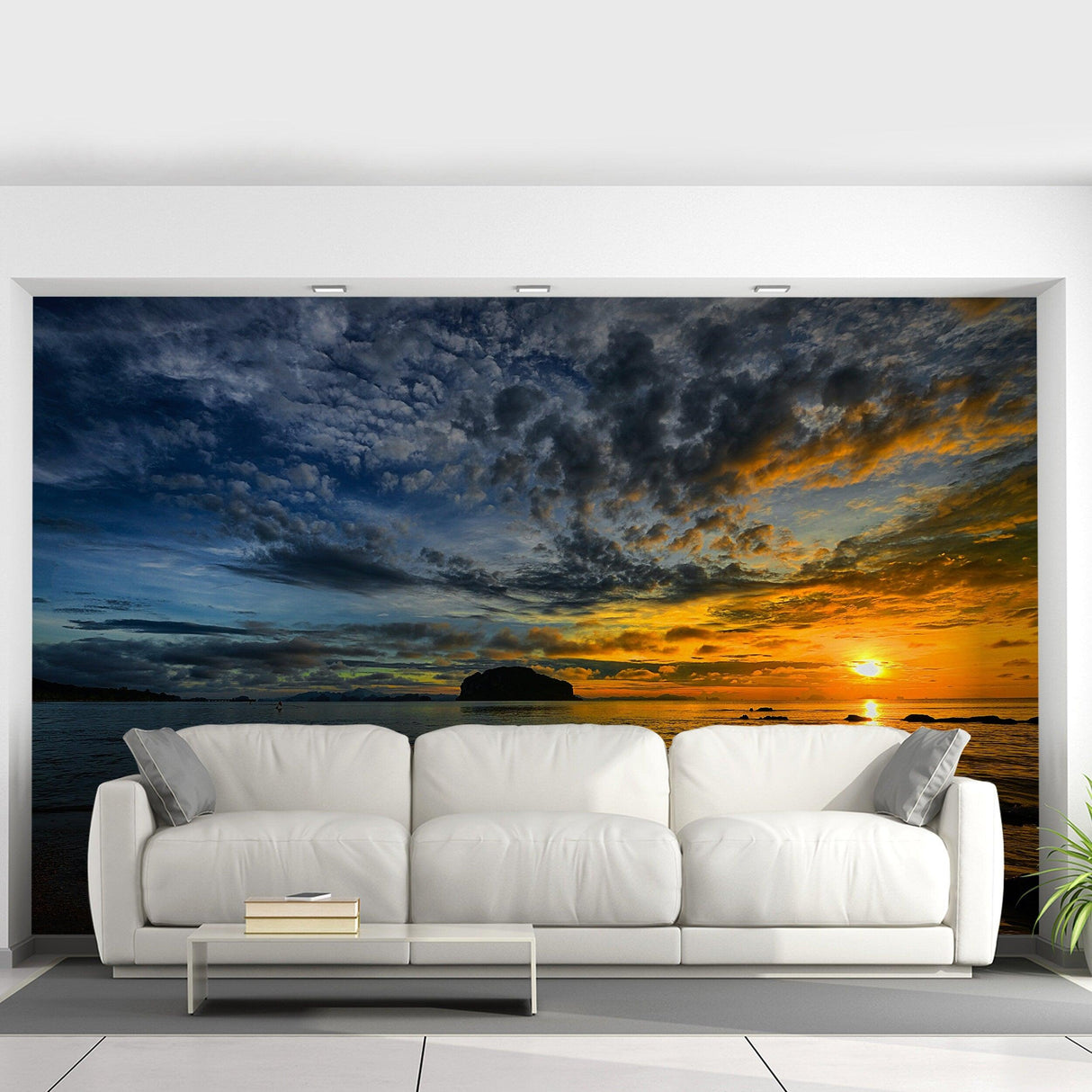 Beautiful sunset wallpaper decal above a modern white sofa, creating a peaceful atmosphere in the living room.