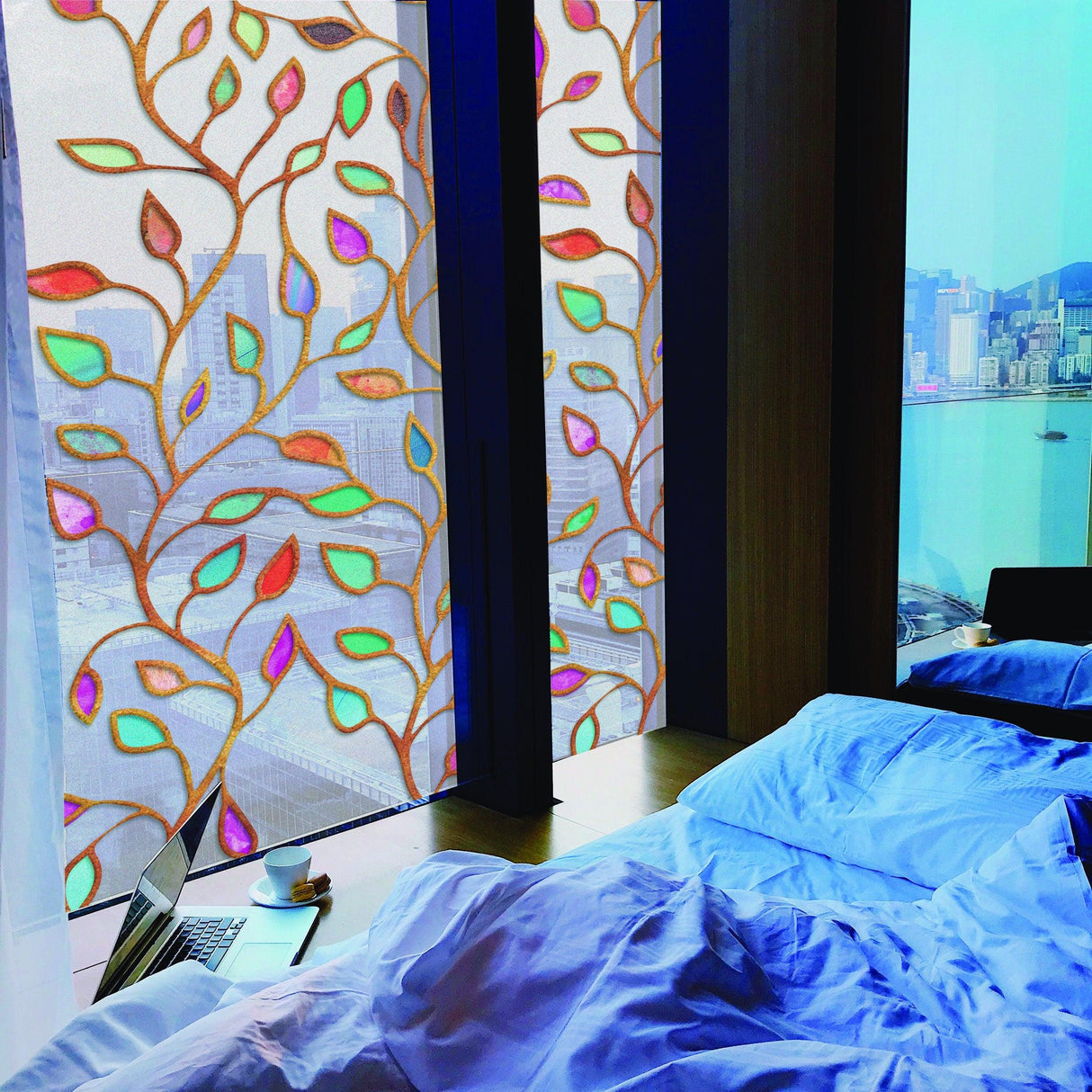 Frosted leaf design window film covering a bedroom window, enhancing privacy and elegance in the room.