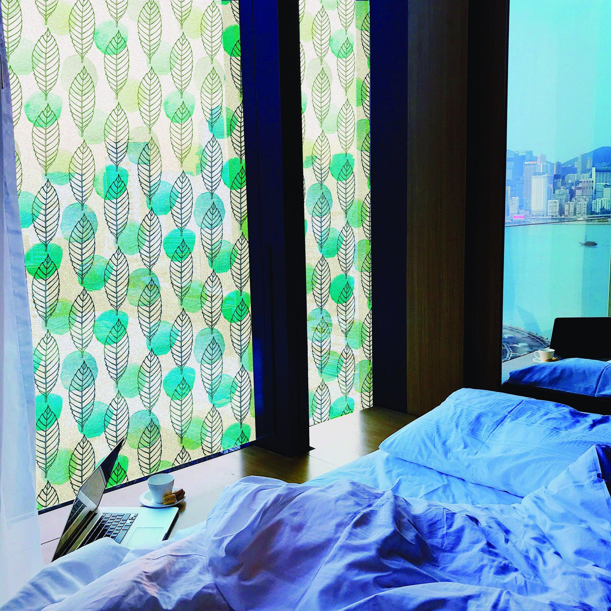 Leaf Window Privacy Glass Film with intricate leaf design providing elegance and privacy in a modern bedroom setting.