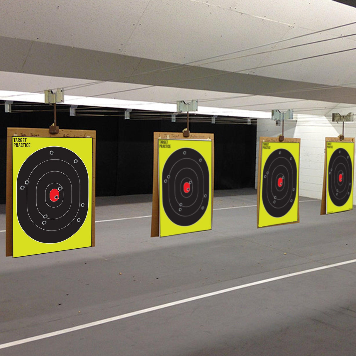 Range shooting targets on a firing range for gun practice, featuring large circles and bright yellow backgrounds.