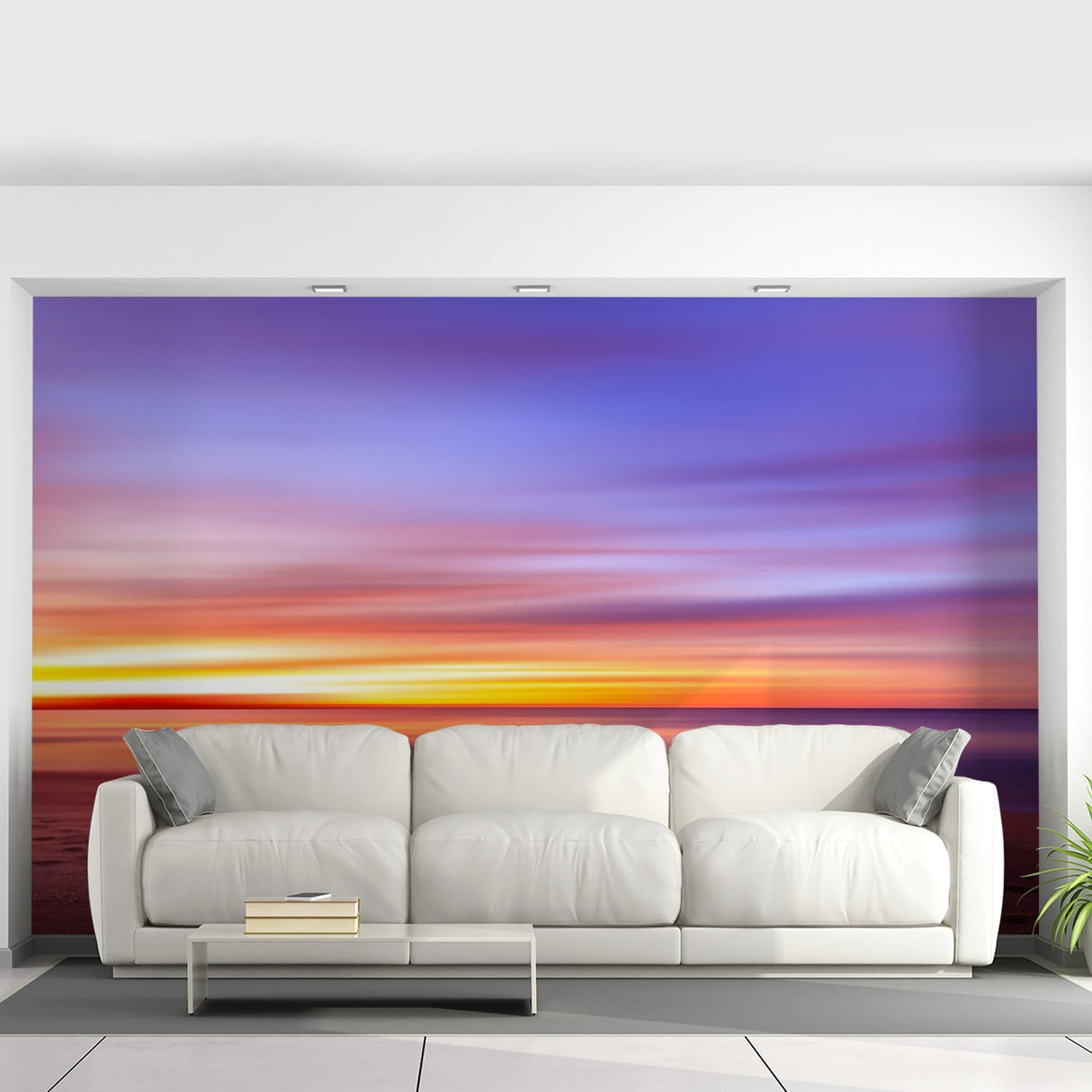 Vibrant sunset wallpaper mural above a modern white sofa in a stylish living room.