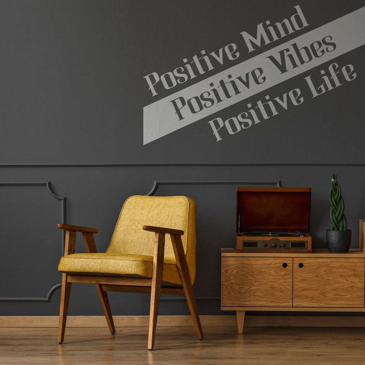 Inspirational vinyl quote sticker decor on wall featuring 'Positive Mind, Positive Vibes, Positive Life' above a yellow chair.