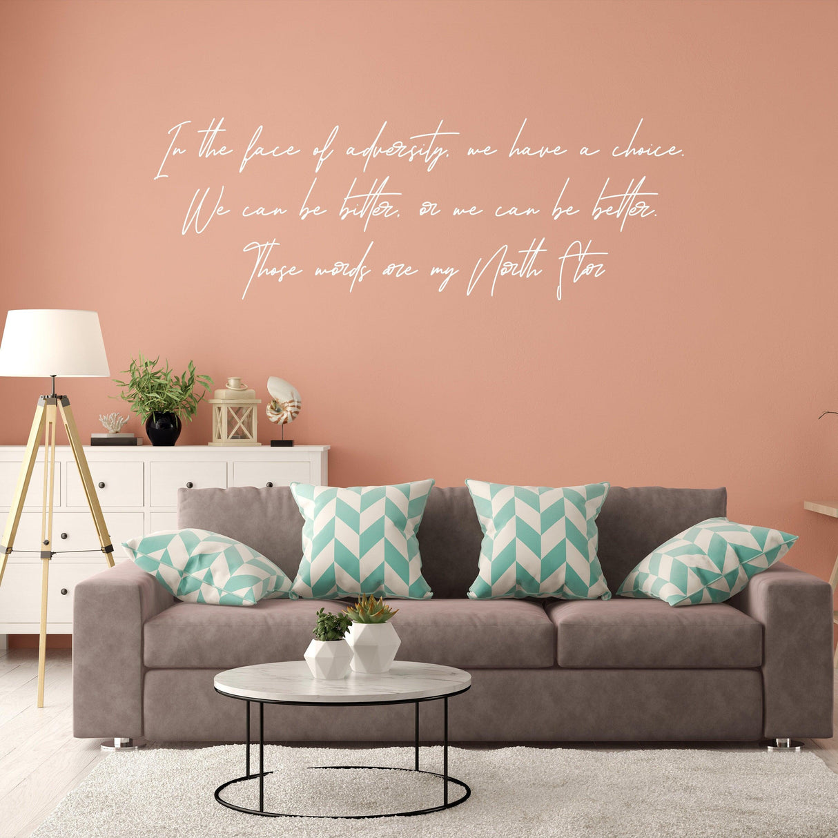 Inspirational wall decor vinyl decal with positive quote in stylish living room setting.