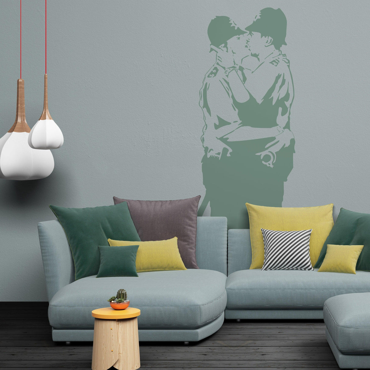 Banksy Police Kissing Wall Sticker decor in a modern living room, featuring bold green vinyl design on a grey wall.