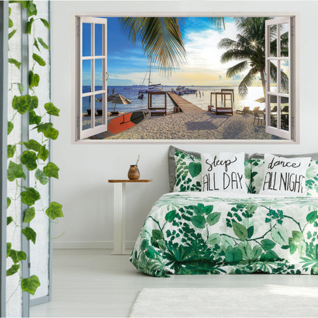 3D window beach view wall sticker in a bedroom, showcasing stunning ocean scene with palm trees and sandy beach.