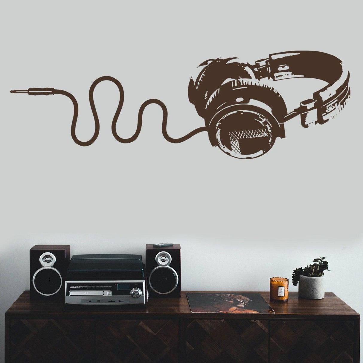 Vinyl DJ headphones wall decal decor for teen boy's room, easy to apply and remove, perfect for music lovers.