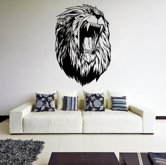 Lion head wall decal above a modern sofa, adding wild elegance to living room decor.
