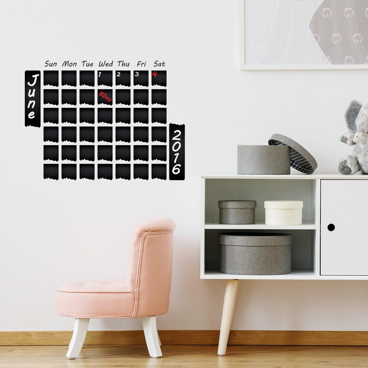 Chalkboard wall planner featuring a monthly calendar layout for June 2016, stylishly displayed in a modern kitchen.