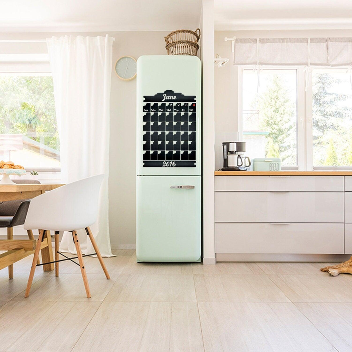 Chalkboard wall planner blackboard sticker on fridge in bright kitchen, perfect for meal planning and organization.