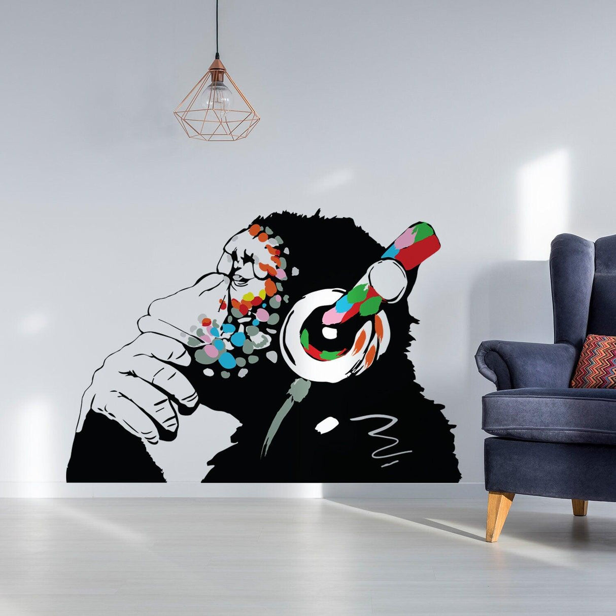 Banksy monkey wall sticker with headphones in colorful design, adding humor to any room decor.