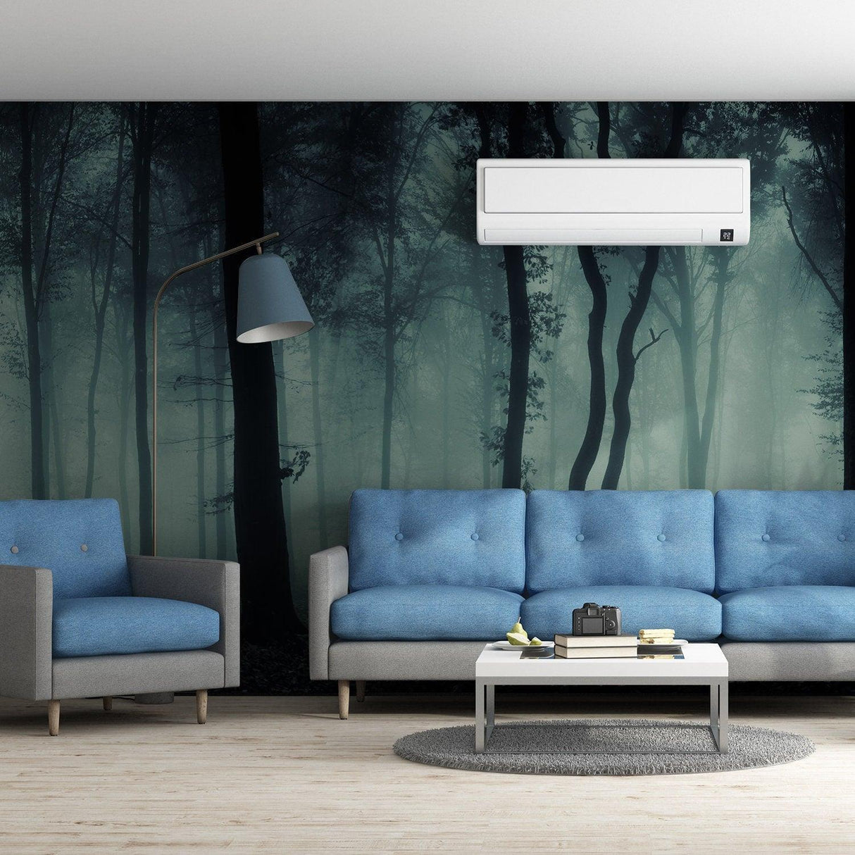 Foggy forest wallpaper mural in modern living room with blue sofa and stylish lamp, creating a serene atmosphere.