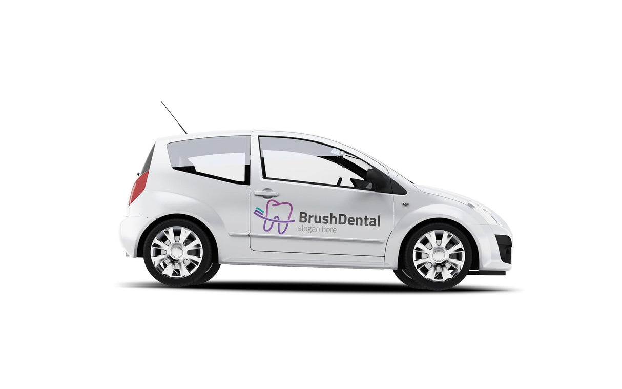 White car with 'Brush Dental' decal on the side, showcasing a custom car design for promotional purposes.