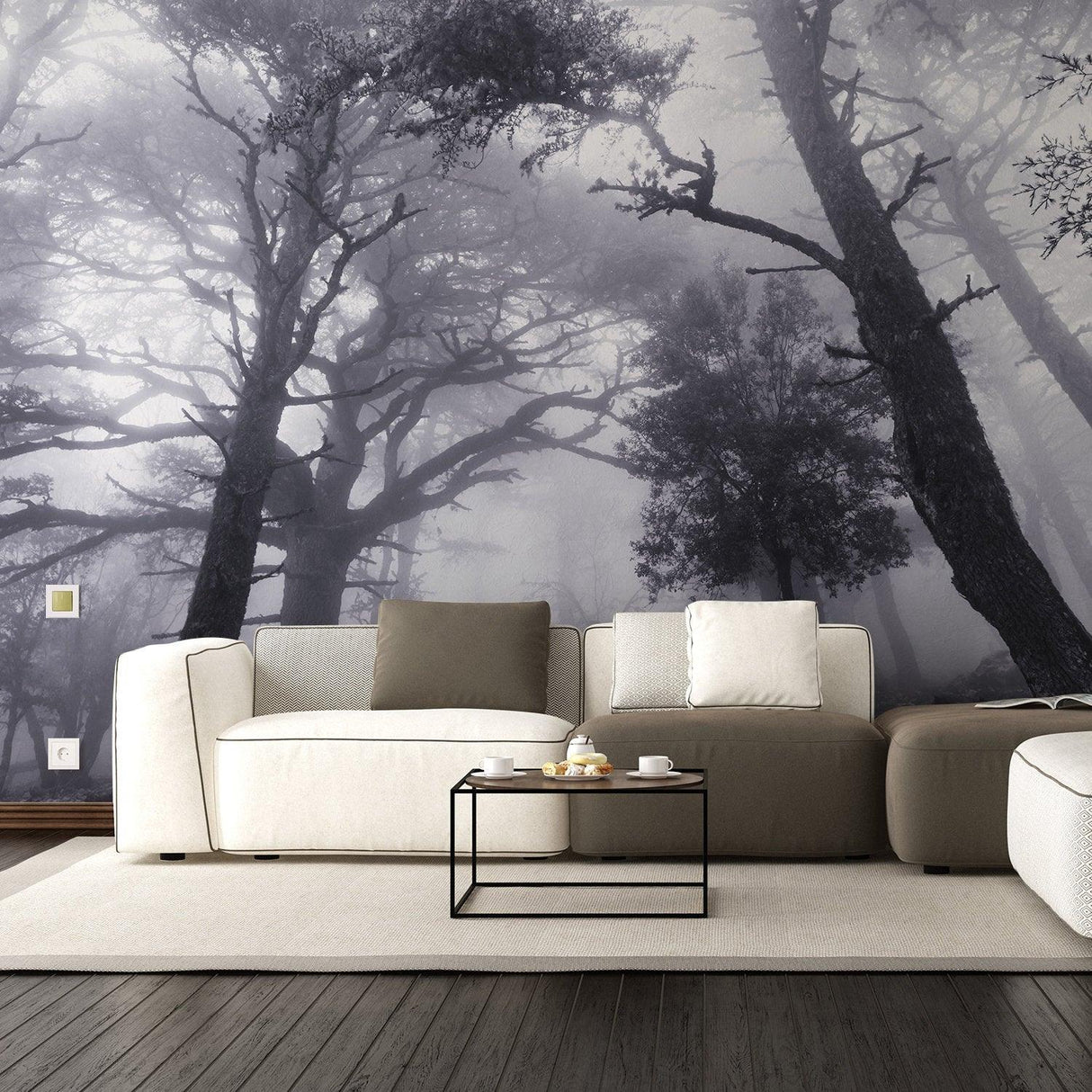 Foggy forest wallpaper mural in a modern living room featuring a cozy sofa and coffee table.