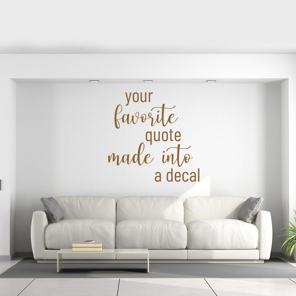 Custom text quote decal on wall above a modern couch, showcasing personalized home decor.