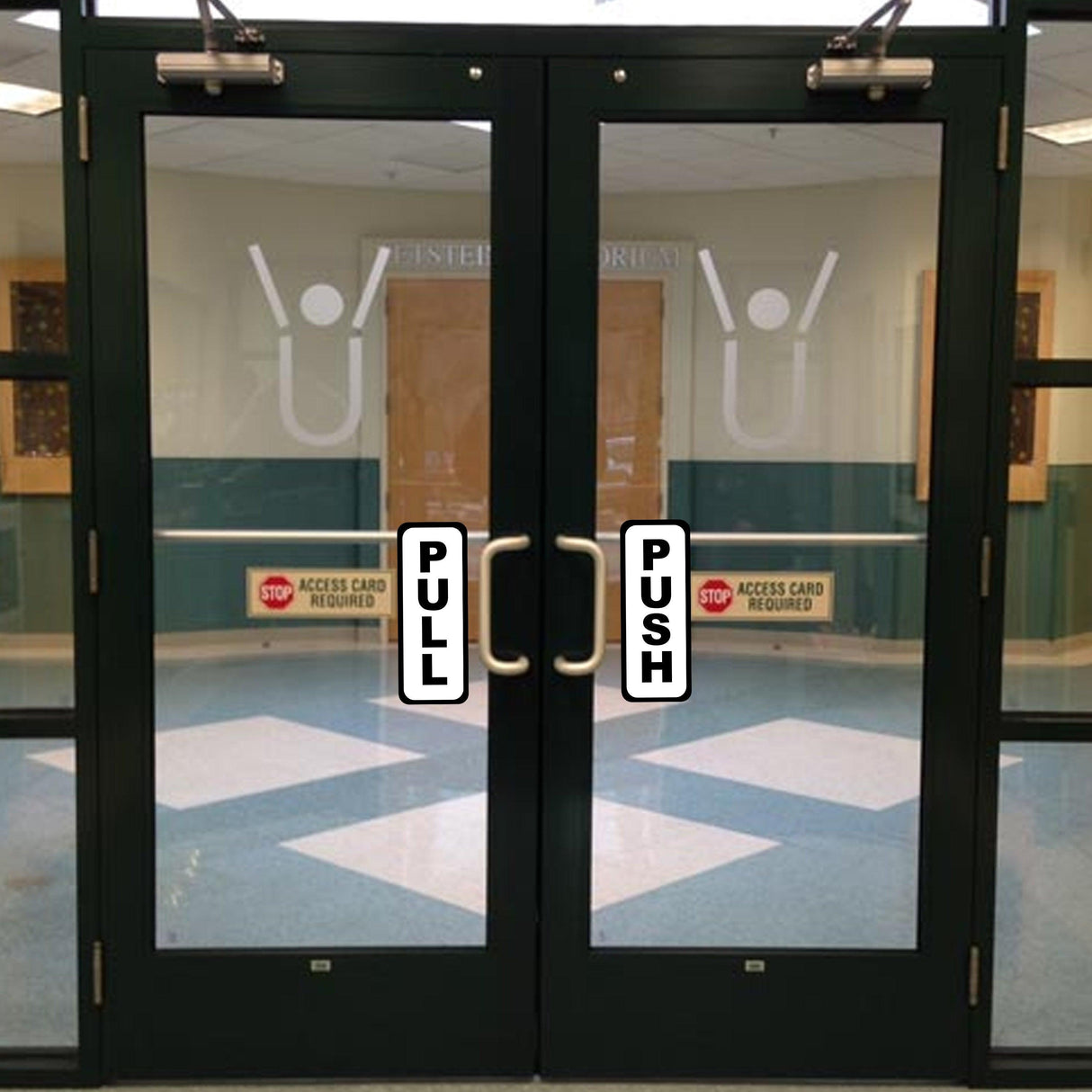 Two glass doors with 'PULL' and 'PUSH' vinyl decals for clear access instructions.