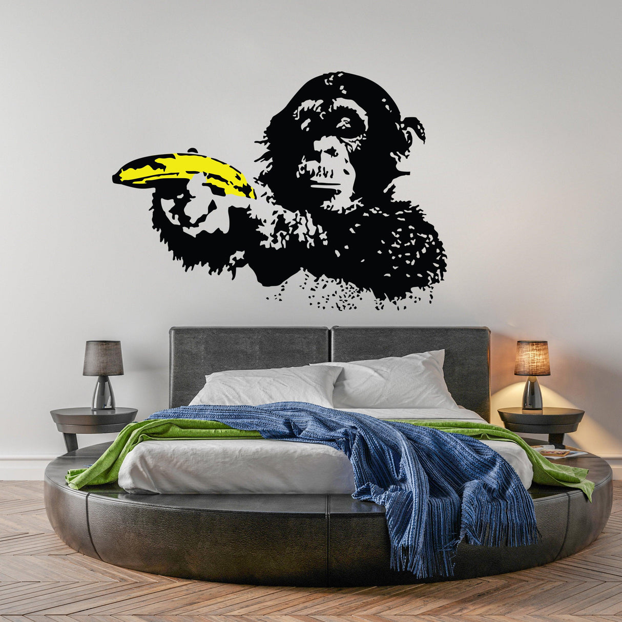 Banksy Monkey Wall Sticker of a monkey holding a banana, adding urban art style to any room decor.
