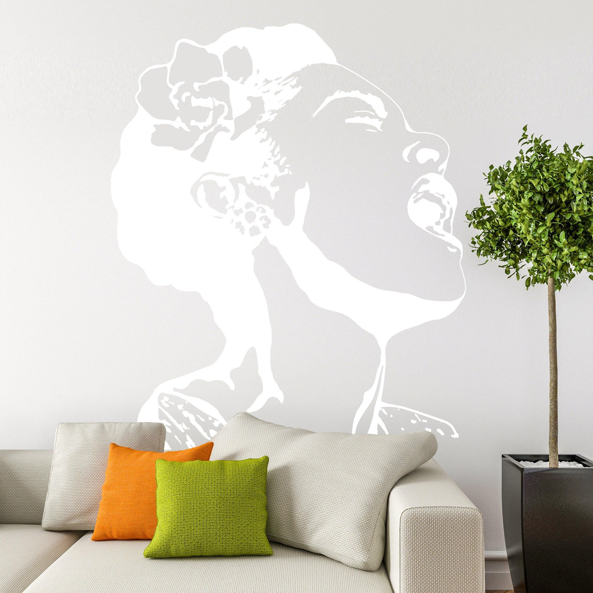 Glow in the dark Banksy wall decal of a singing woman, adding urban art style to a modern living room.