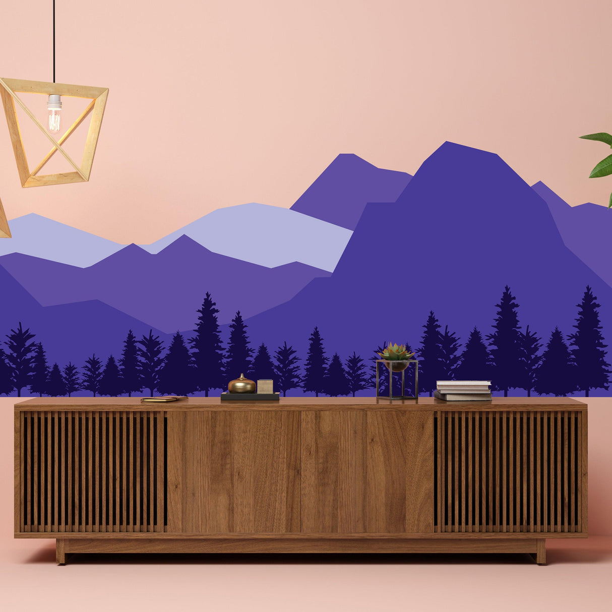 Mountain wall decal in purple tones behind wooden furniture, perfect decor for a nursery or kids' room.