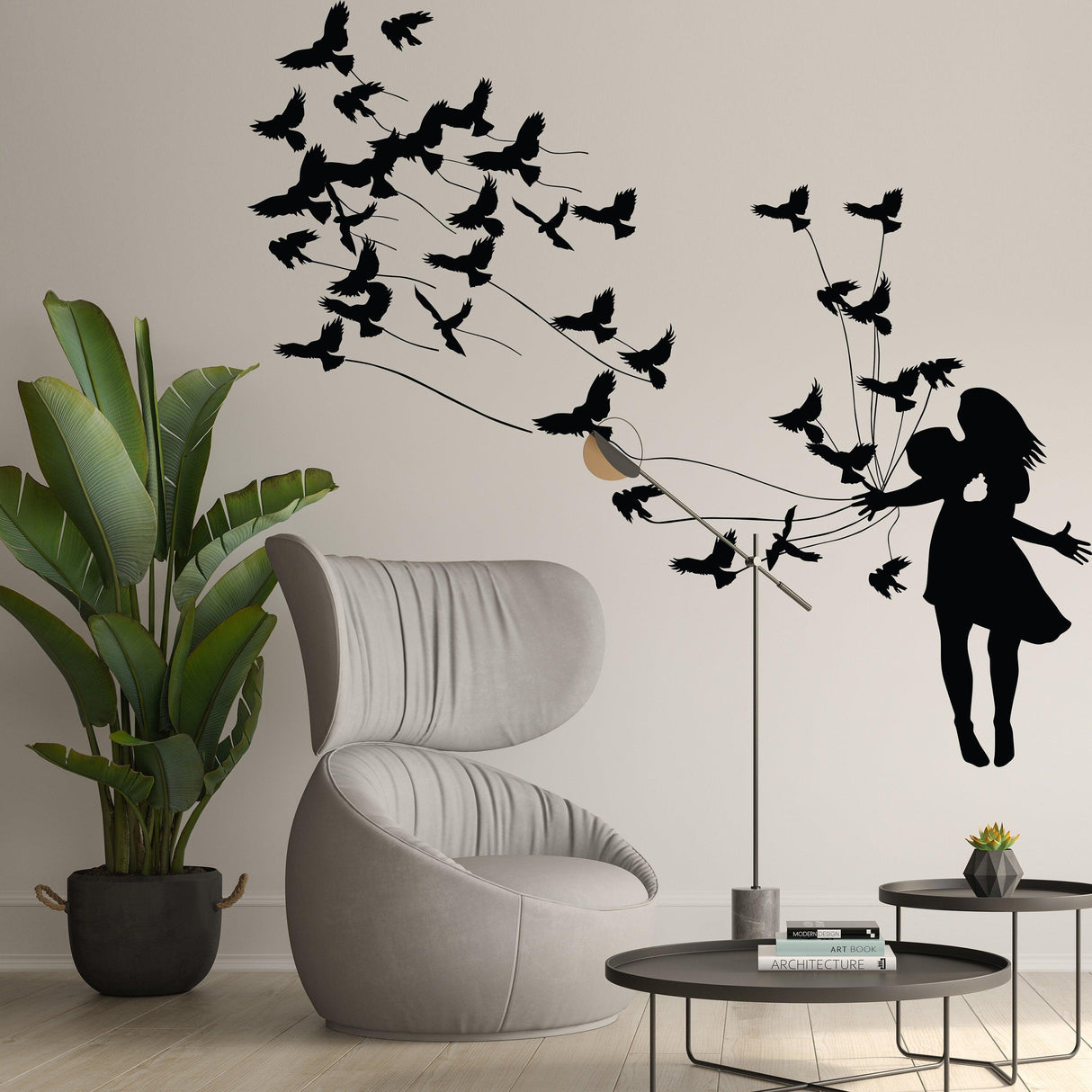Kissing wall decal featuring birds and a couple silhouette, adding charm to modern room decor.