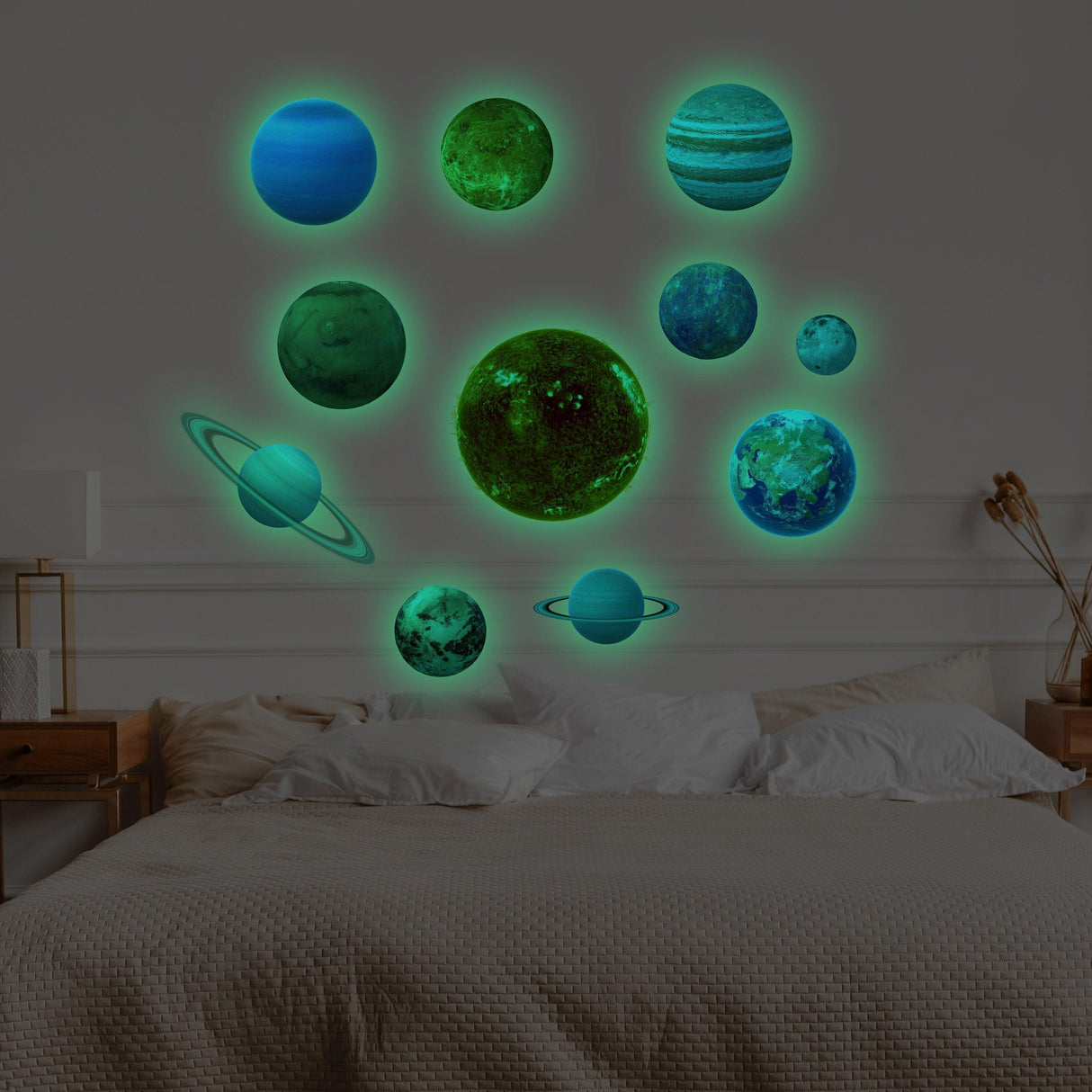 Glow in the dark planet wall decals illuminating a bedroom wall, showcasing the solar system's planets.