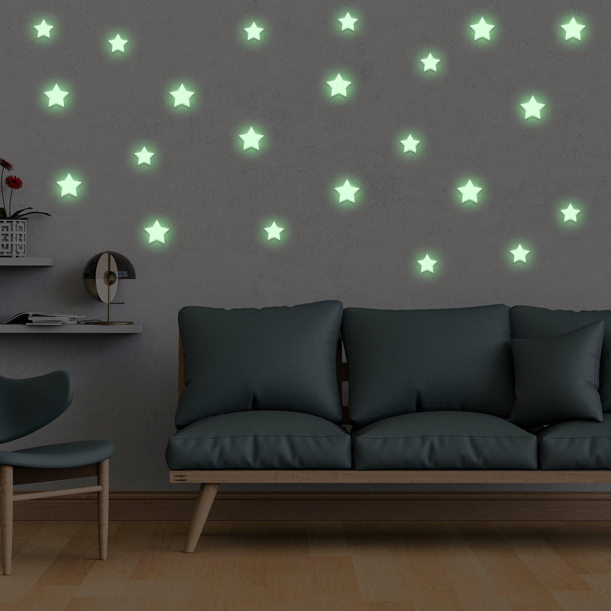 Glow in the dark star stickers on a wall above a modern sofa in a stylish living room.