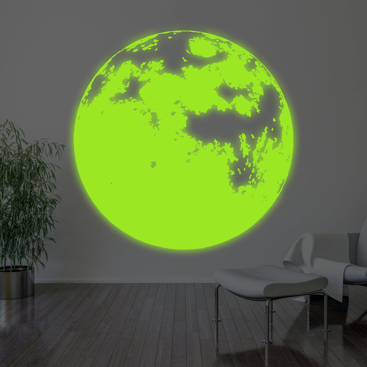 Glow in the dark moon wall decal creating a magical night light effect in a nursery or kids' room.