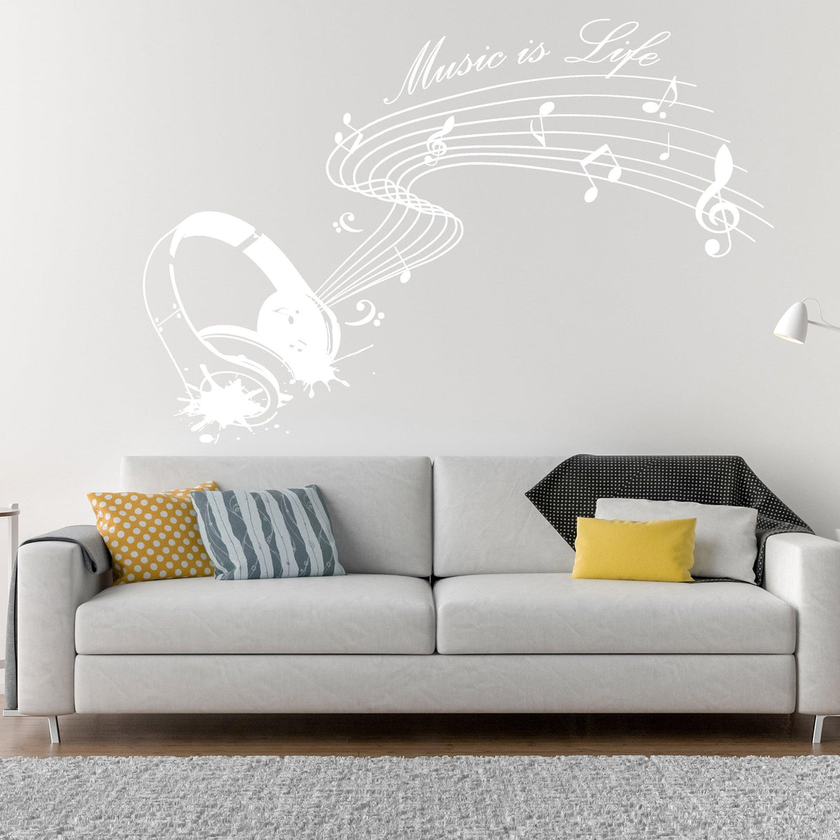 Glow in dark wall sticker design featuring headphones and musical notes with text 'Music is Life' above a couch.