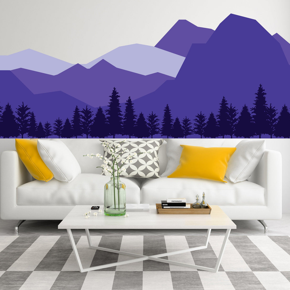 Mountain wall decal in purple tones above a modern white sofa with decorative pillows, adding nature decor to a stylish room.