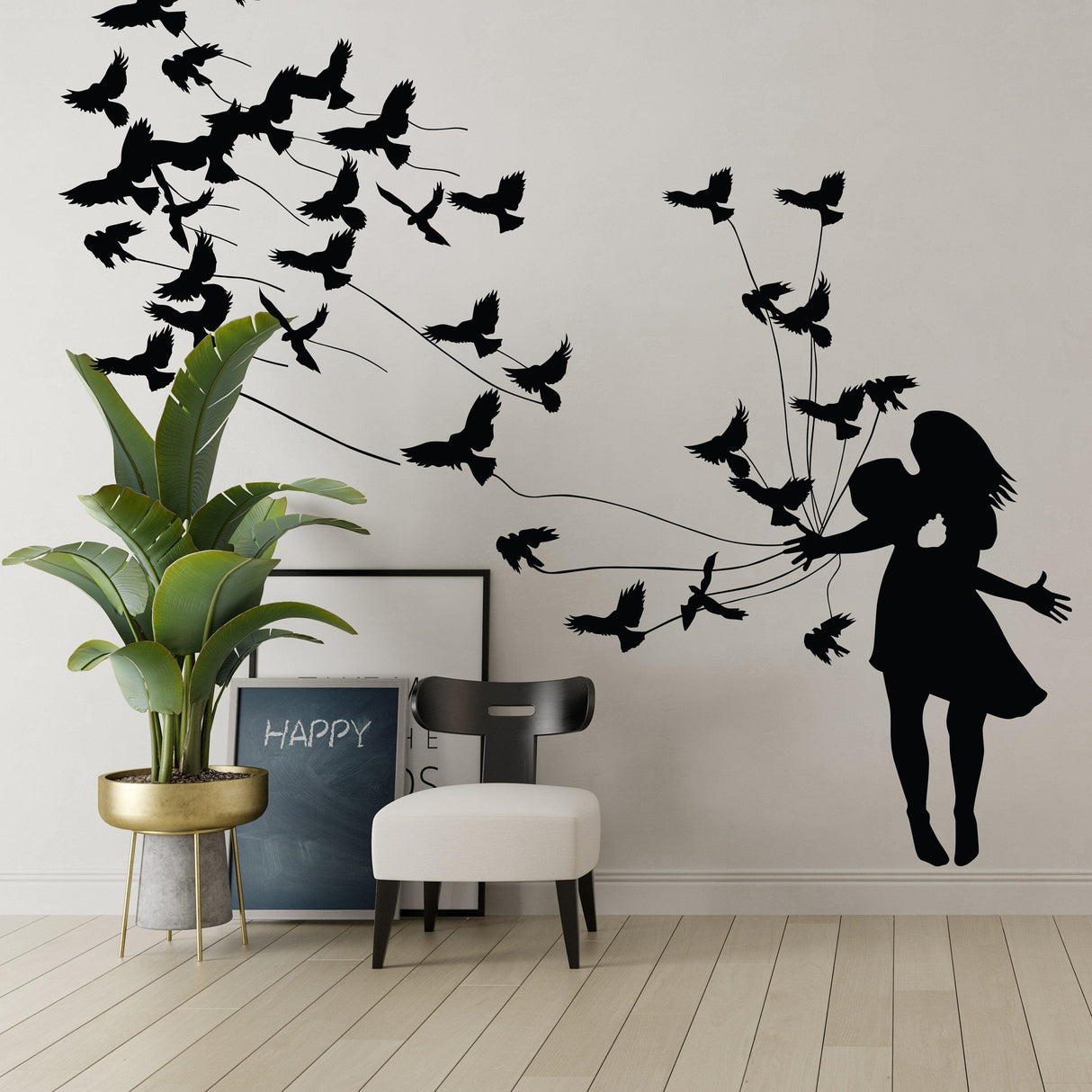 Kissing wall decal featuring silhouettes of a couple and birds, ideal for home decor.