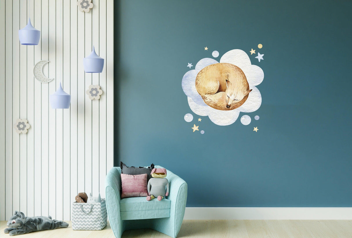 Dreamy baby nursery wall sticker featuring a sleeping fox on fluffy clouds, perfect for children's rooms.