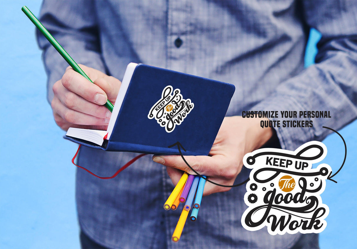 Person holding a notebook with colorful pens, featuring a customizable quote sticker design.
