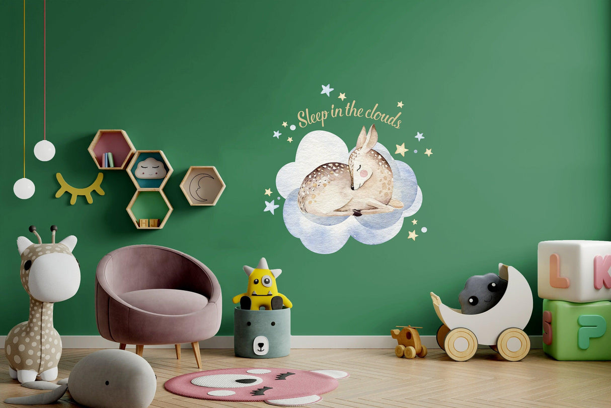 Baby nursery wall decor sticker featuring a cute rabbit on a cloud surrounded by stars, perfect for a boy or girl room.