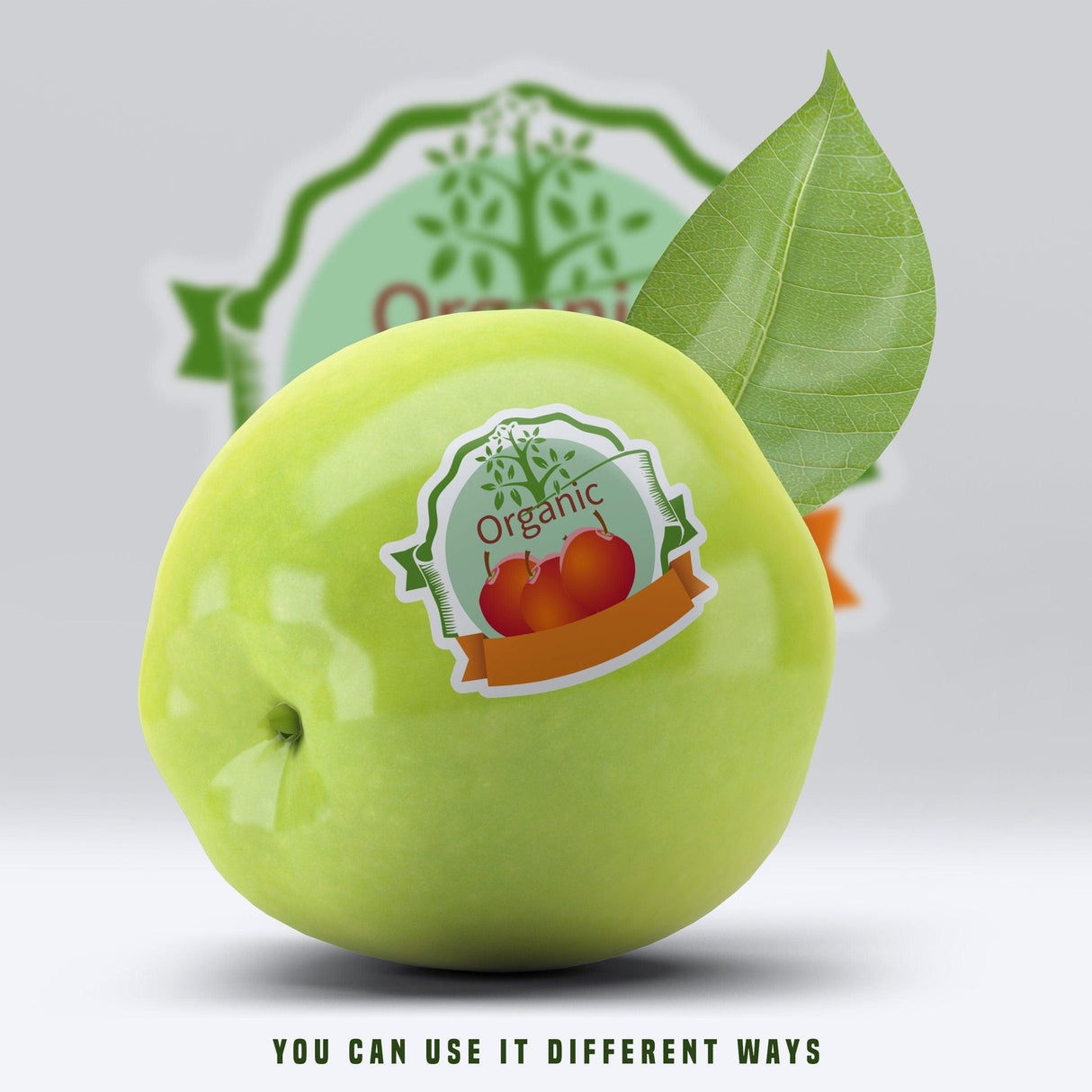 Organic green apple with a custom logo sticker, showcasing versatility in branding and product promotion.