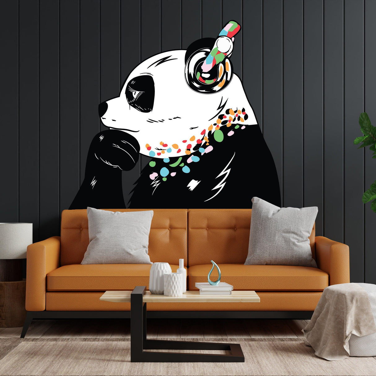 Panda in headphones wall sticker adorned with colorful decor above a modern sofa in a stylish living room.
