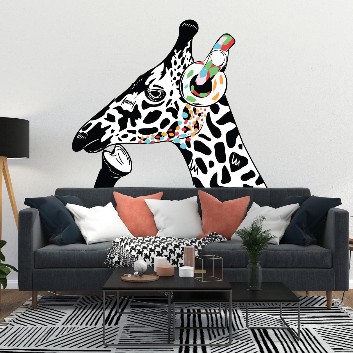 Colorful giraffe wall sticker with headphones in a stylish living room setting.