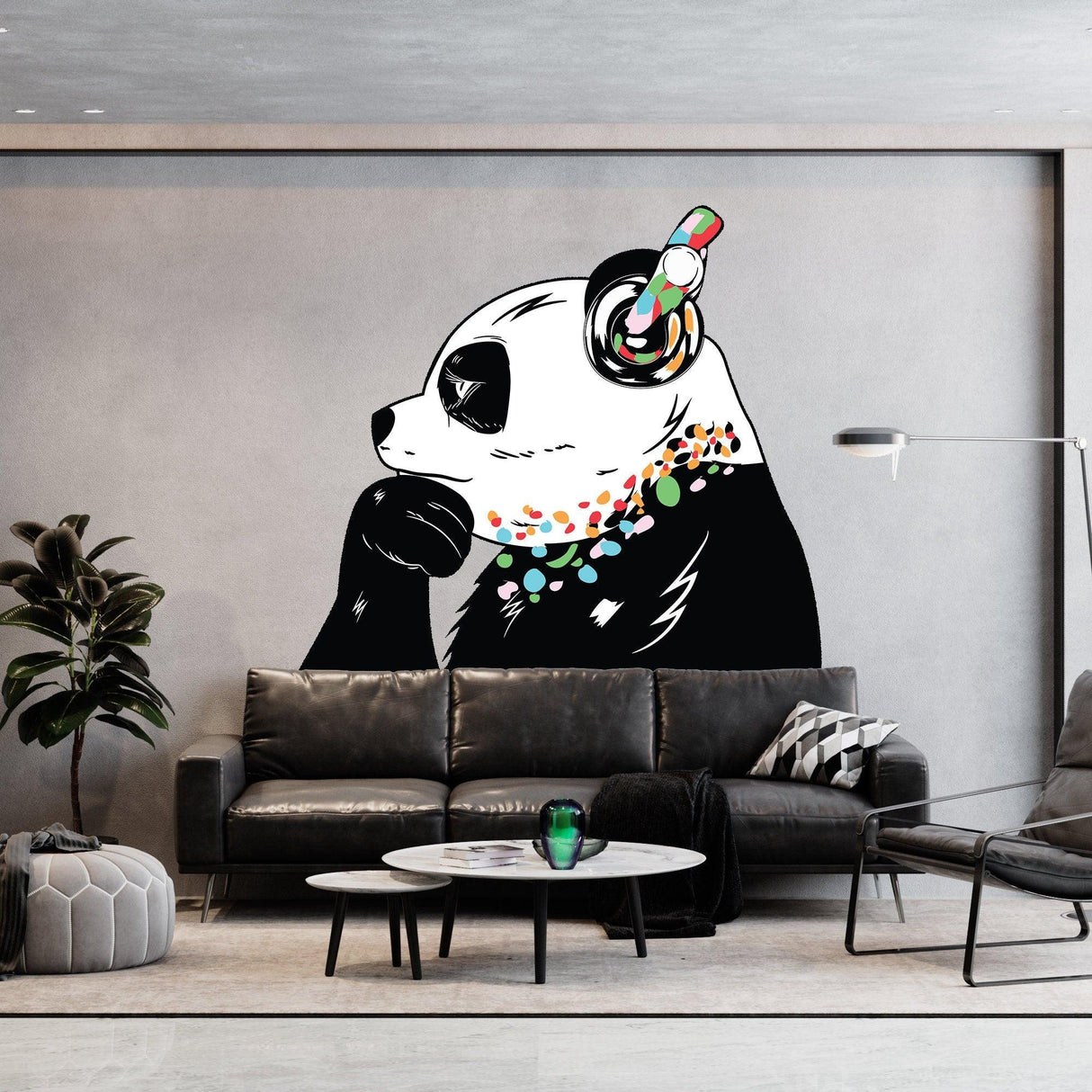 Thinking Panda wall decal with headphones, inspired by Banksy, adds creativity to modern living room decor.