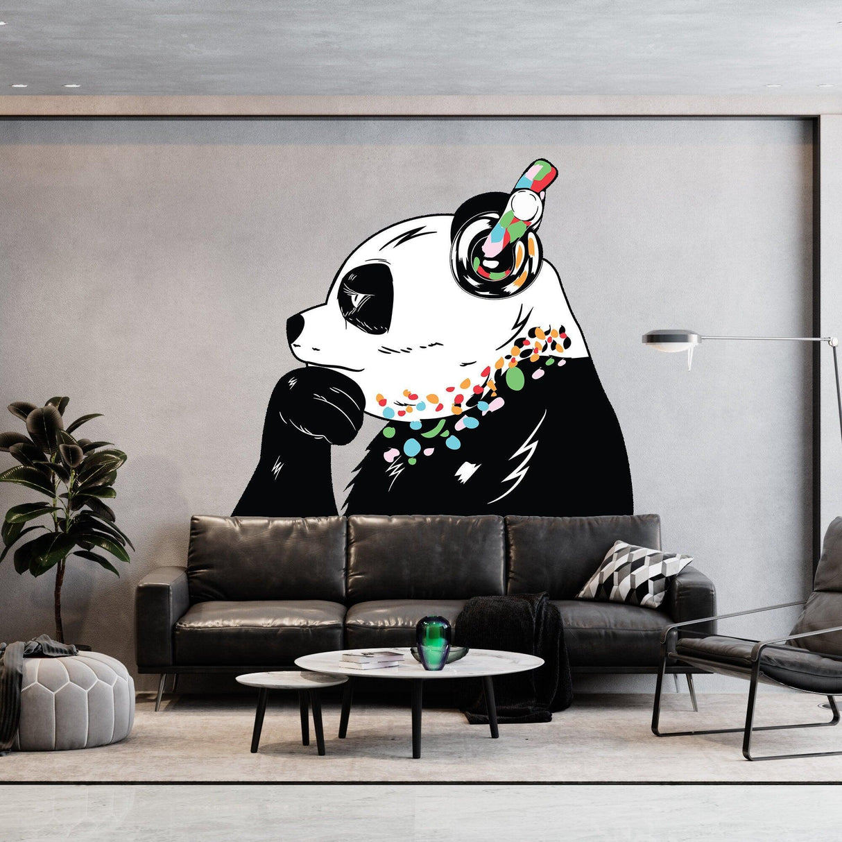 Panda wall sticker featuring a panda with headphones sitting in a modern living room setting.