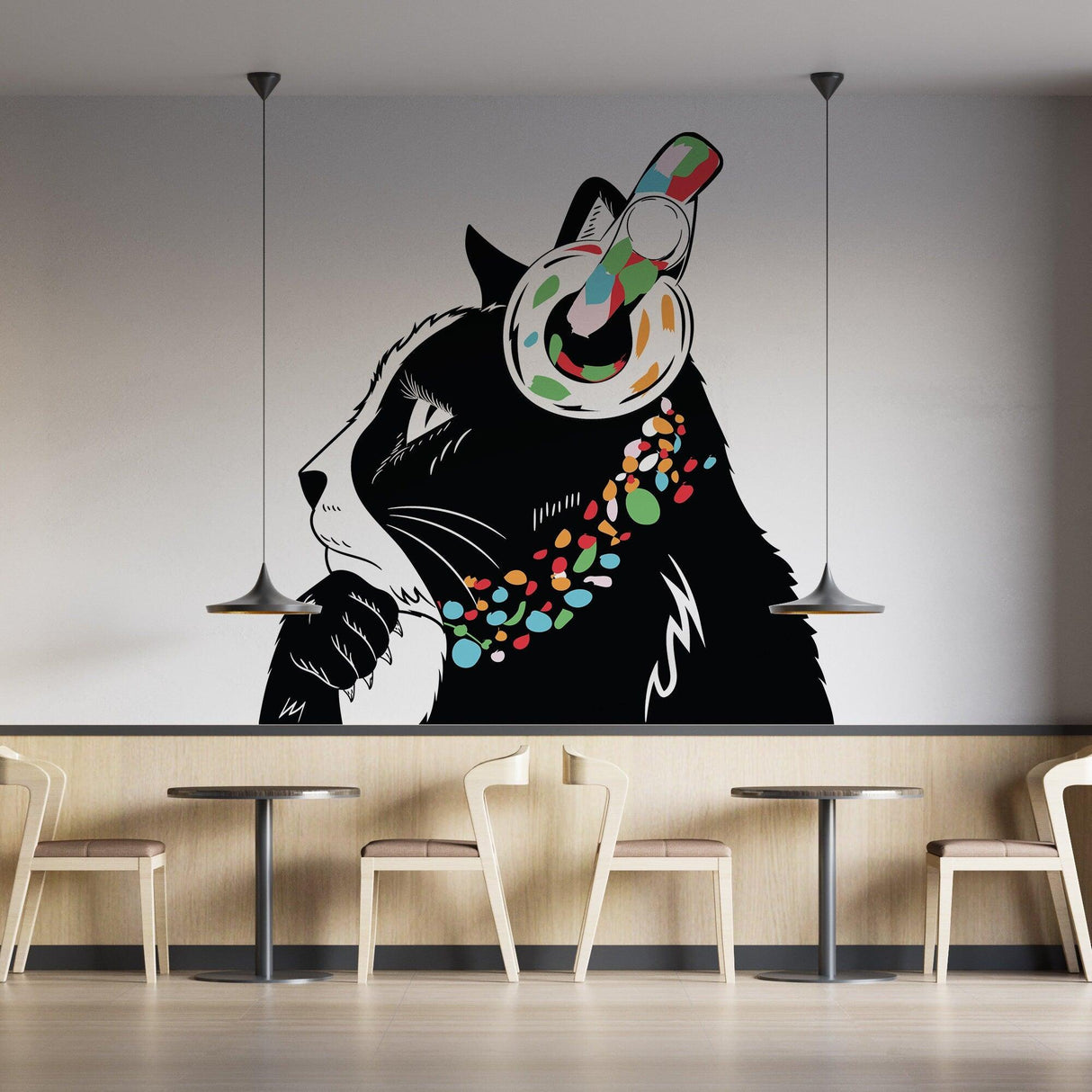 Vinyl decal of a thoughtful black cat wearing colorful headphones in a modern cafe setting.