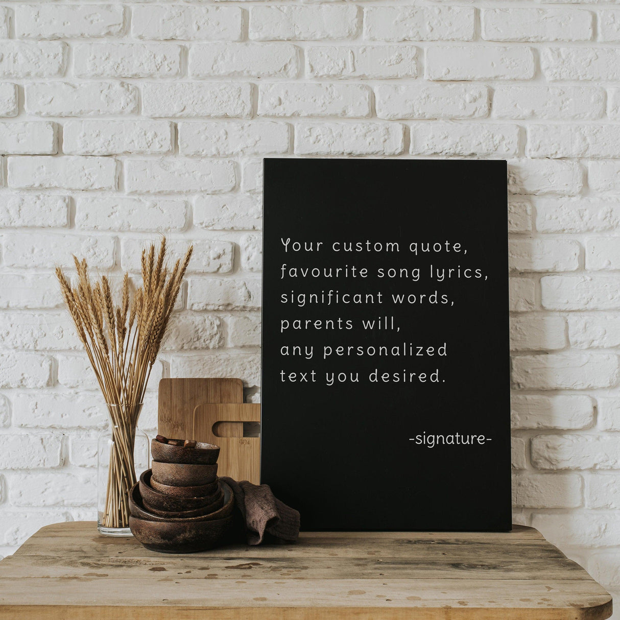 Customized motivational canvas artwork displaying a personalized quote on a black background, perfect for home decor.
