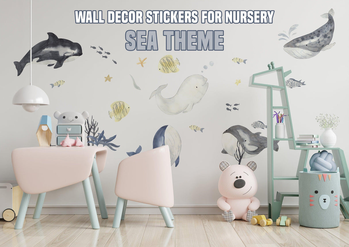 Colorful sea theme wall stickers featuring whales and marine life for kids' nursery decor.