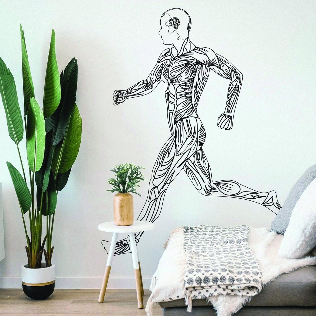Mens body silhouette wall decal of a running figure, perfect for gym or office decor.
