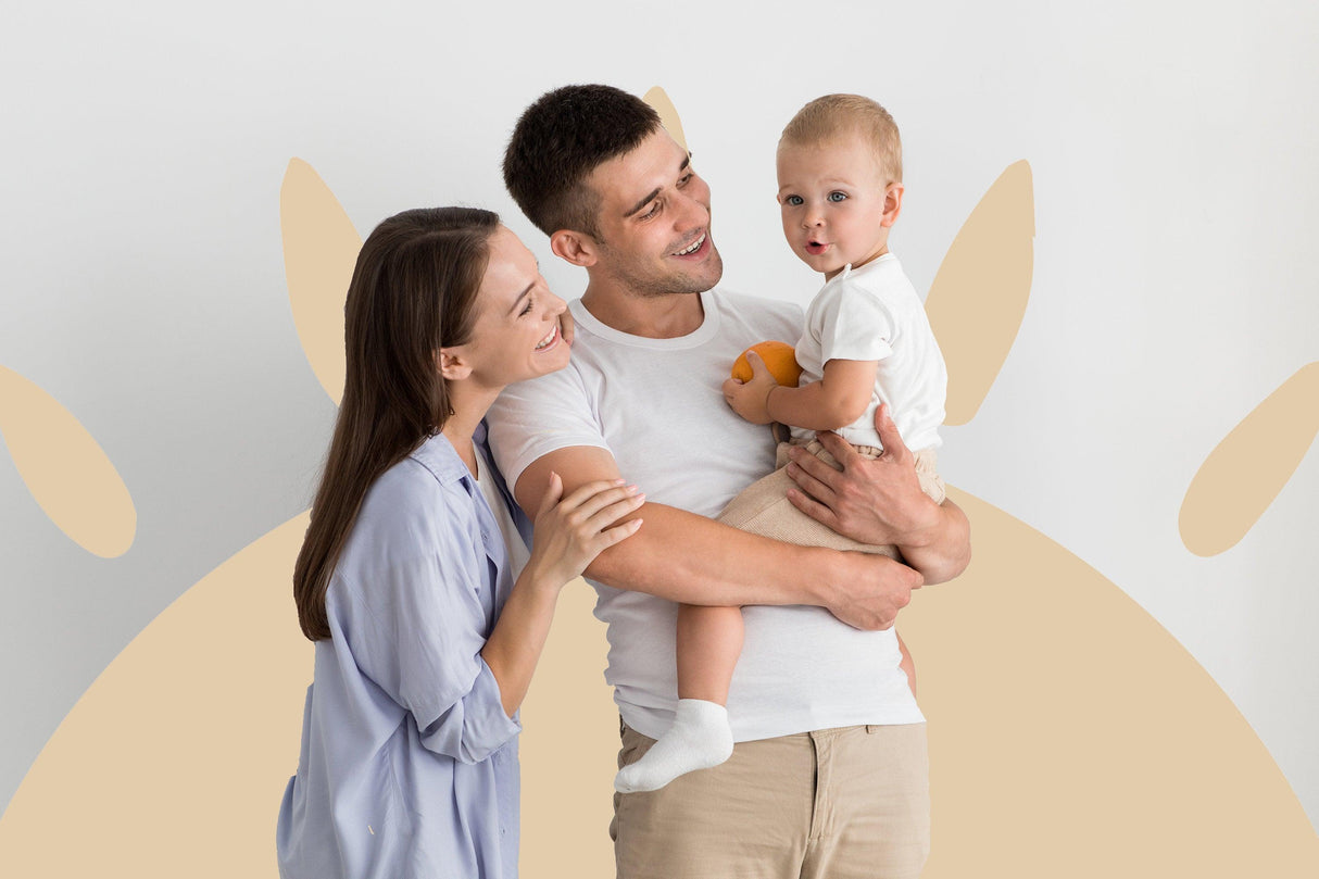 Family enjoying time together in a bright room with a whimsical sun wall decal, perfect for home decor.