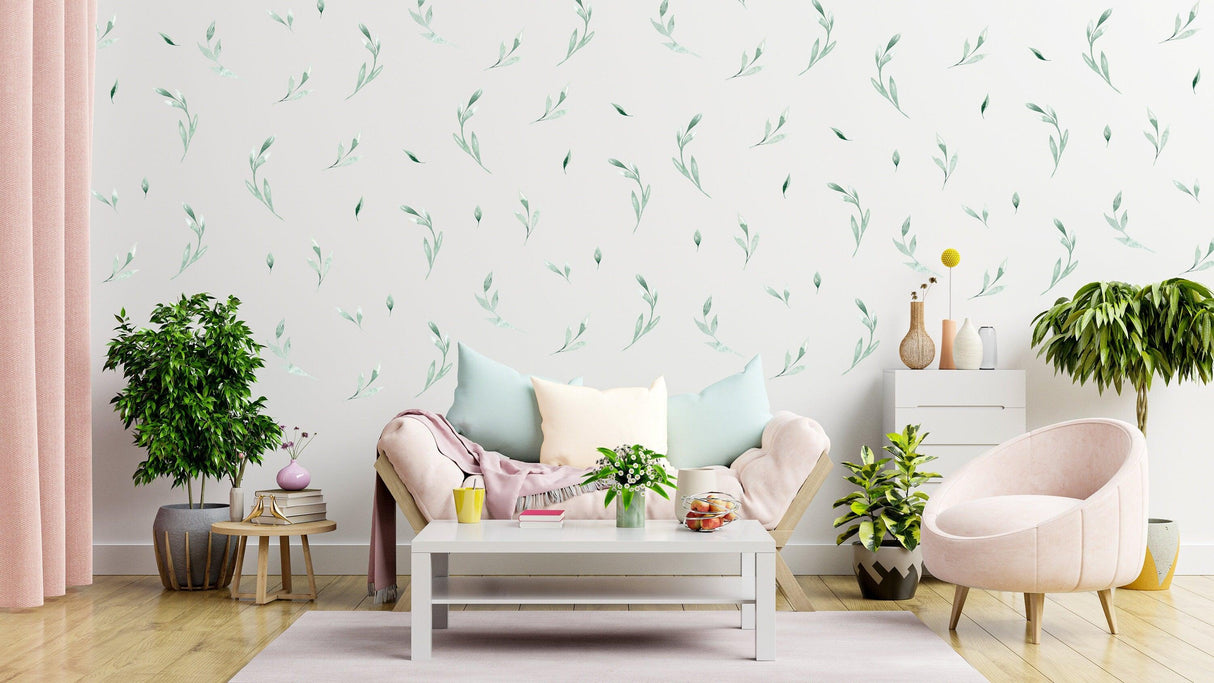 Living room with leaf wall decor stickers, showcasing a vibrant botanical theme with green leaf decals.