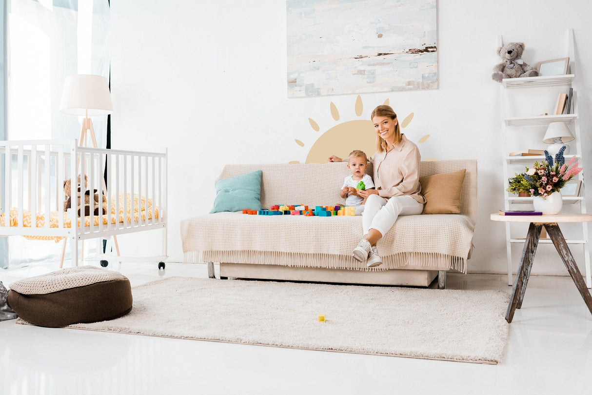 Mom and child enjoying colorful playtime in a bright room featuring the Sunshine Delight wall sticker.