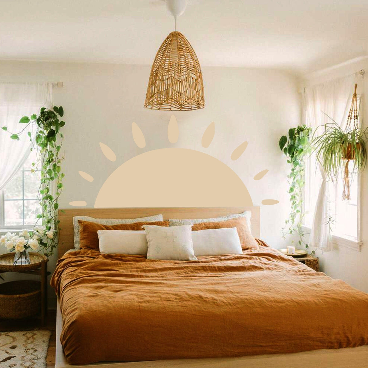 Sunshine Delight vinyl wall sticker in a cozy bedroom with a warm color palette and plants.