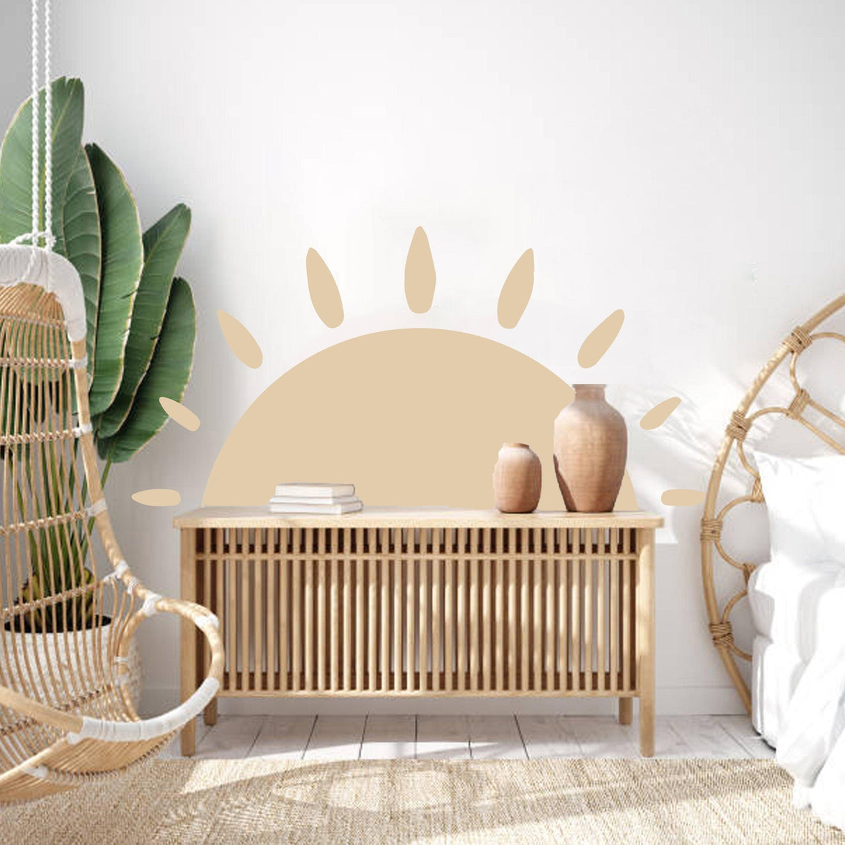 Boho sun wall decal in a nursery, enhancing decor with warmth and charm.