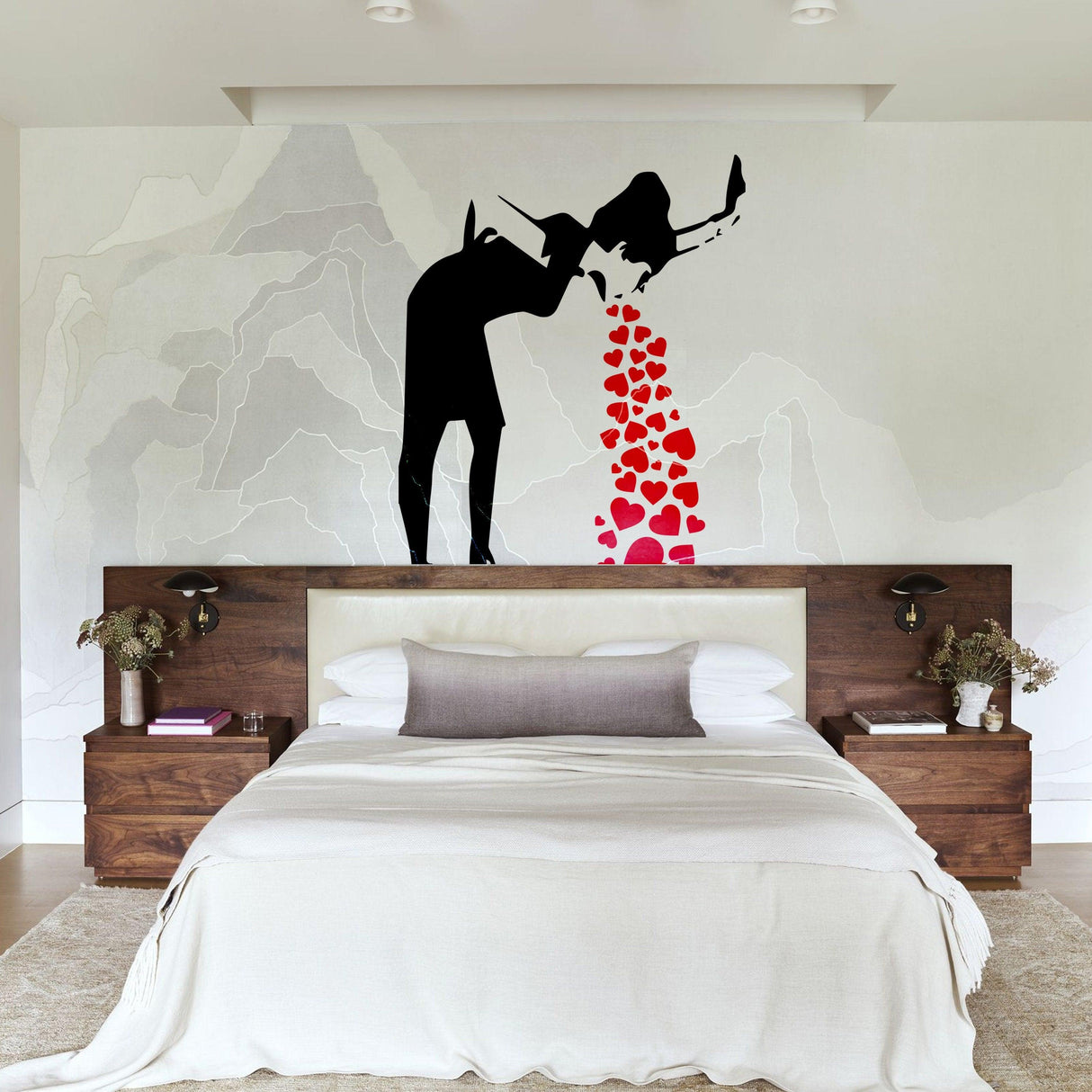 Banksy Love Sick Girl wall decal in modern bedroom with heart-shaped sticker design.