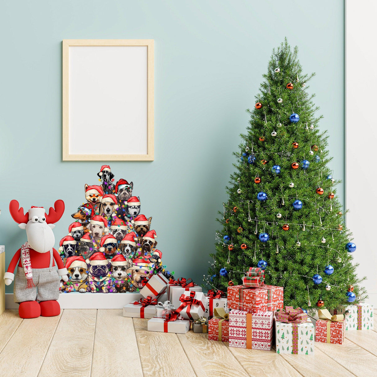 Whimsical dog-themed Christmas tree wall sticker next to a decorated holiday tree with presents.