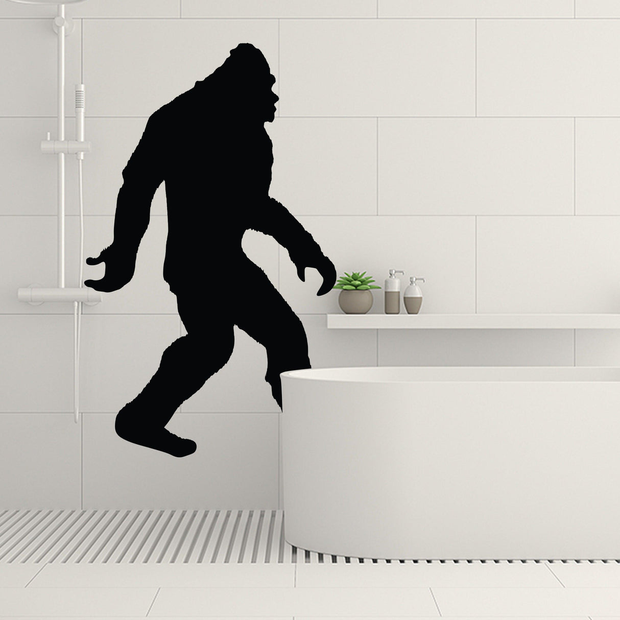 Funny Big Foot Sasquatch vinyl wall decal in a modern bathroom setting.